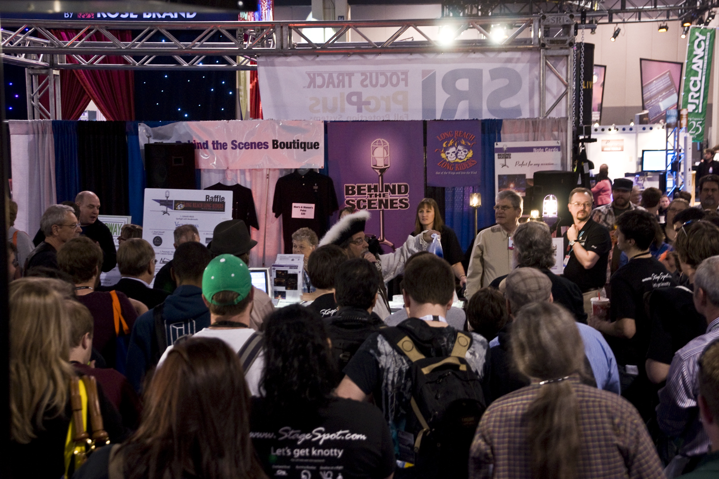 Crowd on show floor for announcement of Behind the Scenes raffle winners
