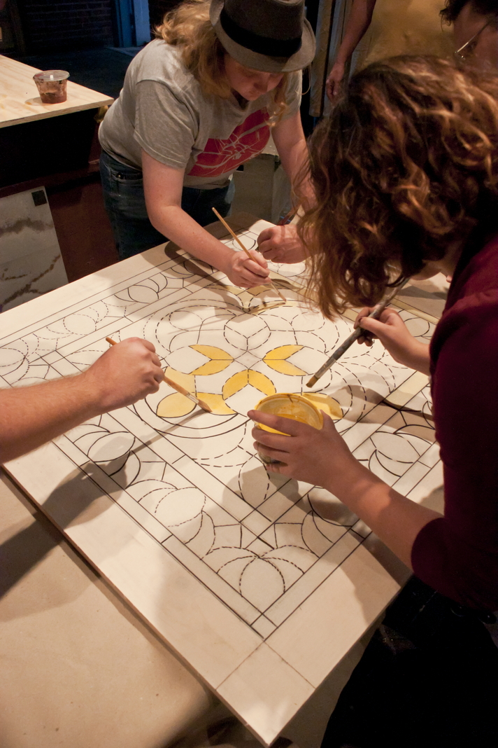 Participants painting by numbers