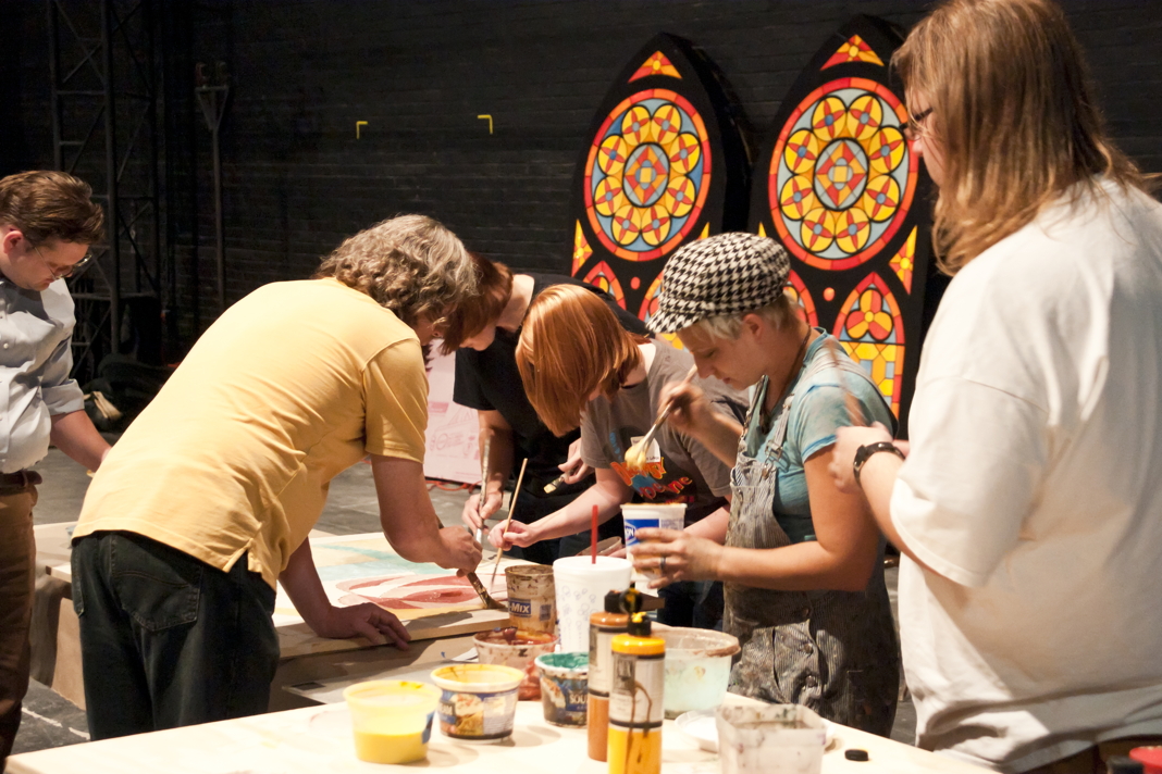 Participants paint by numbers